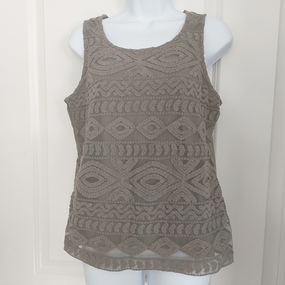 Mixed media sleeveless tank. Front is mesh lace and is lined. Back is t-shirt.